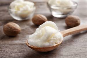 botanical butter in a wooden spoon